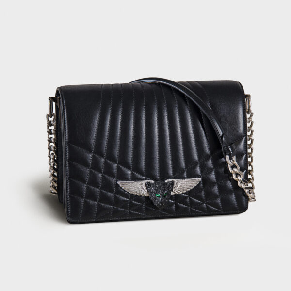 Black quilted leather handbag with silver chain strap and winged emblem.