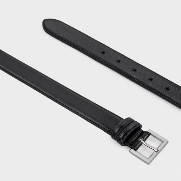 Black leather belt with a silver rectangular buckle.