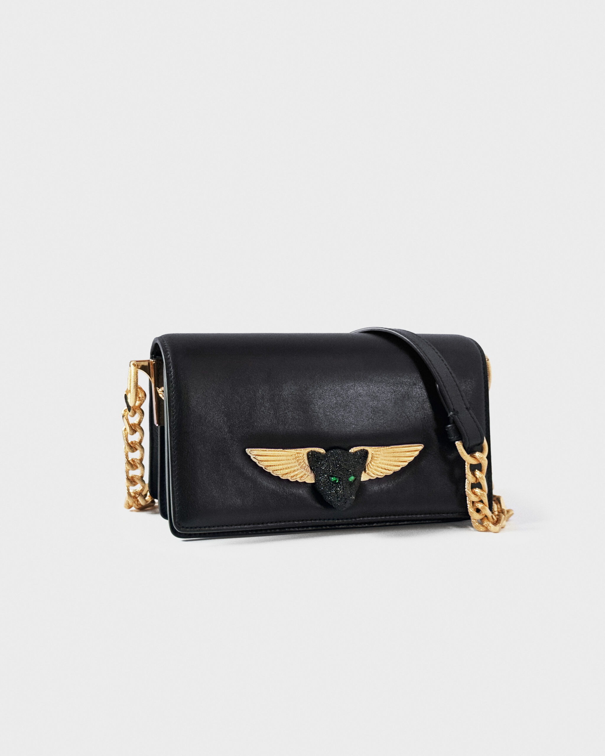 Elegant black leather handbag with gold winged emblem and chain strap.