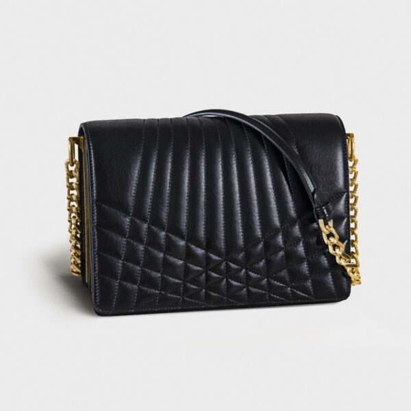 Black quilted leather handbag with gold chain strap.