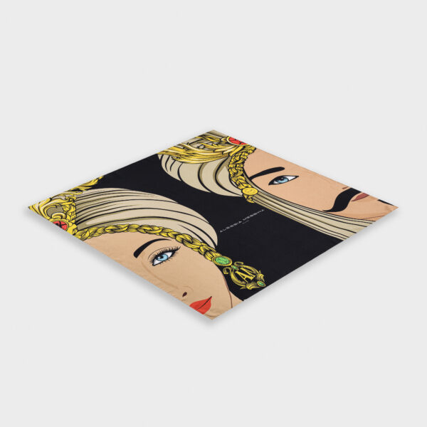 Stylish rug featuring illustrated faces with gold accents on a black background.