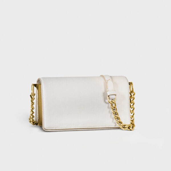 Elegant white leather purse with gold chain strap.