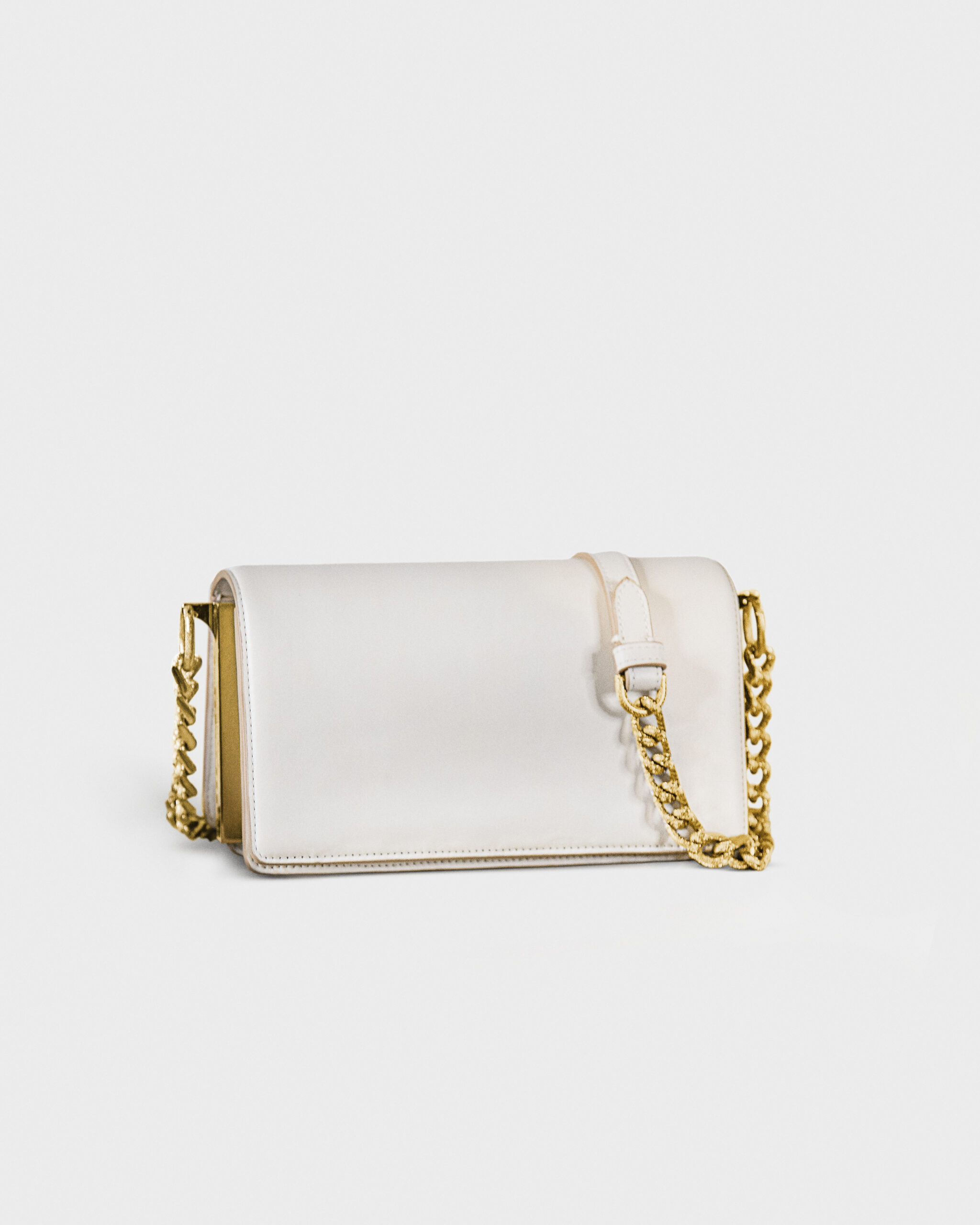 Elegant white leather purse with gold chain strap.
