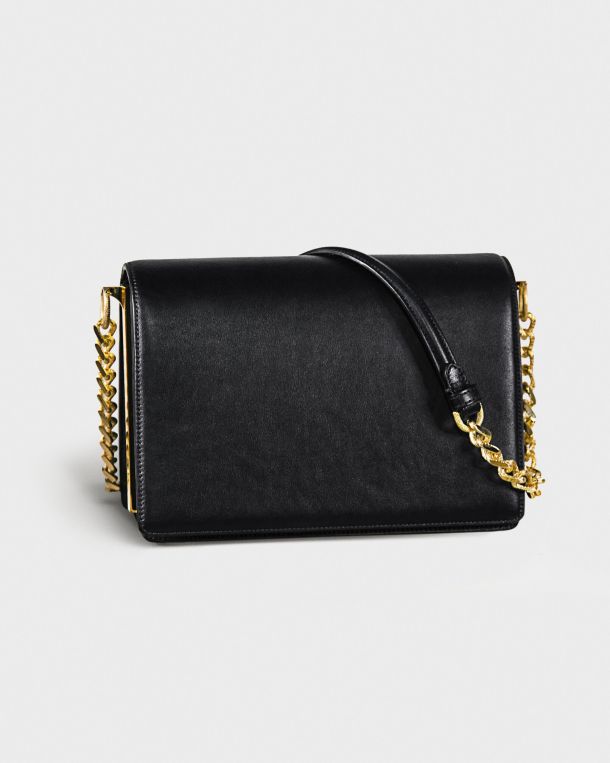 Elegant black leather handbag with gold chain straps.